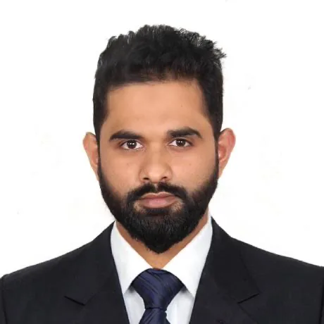 Original formal photograph of Azharul Islam in a suit and tie